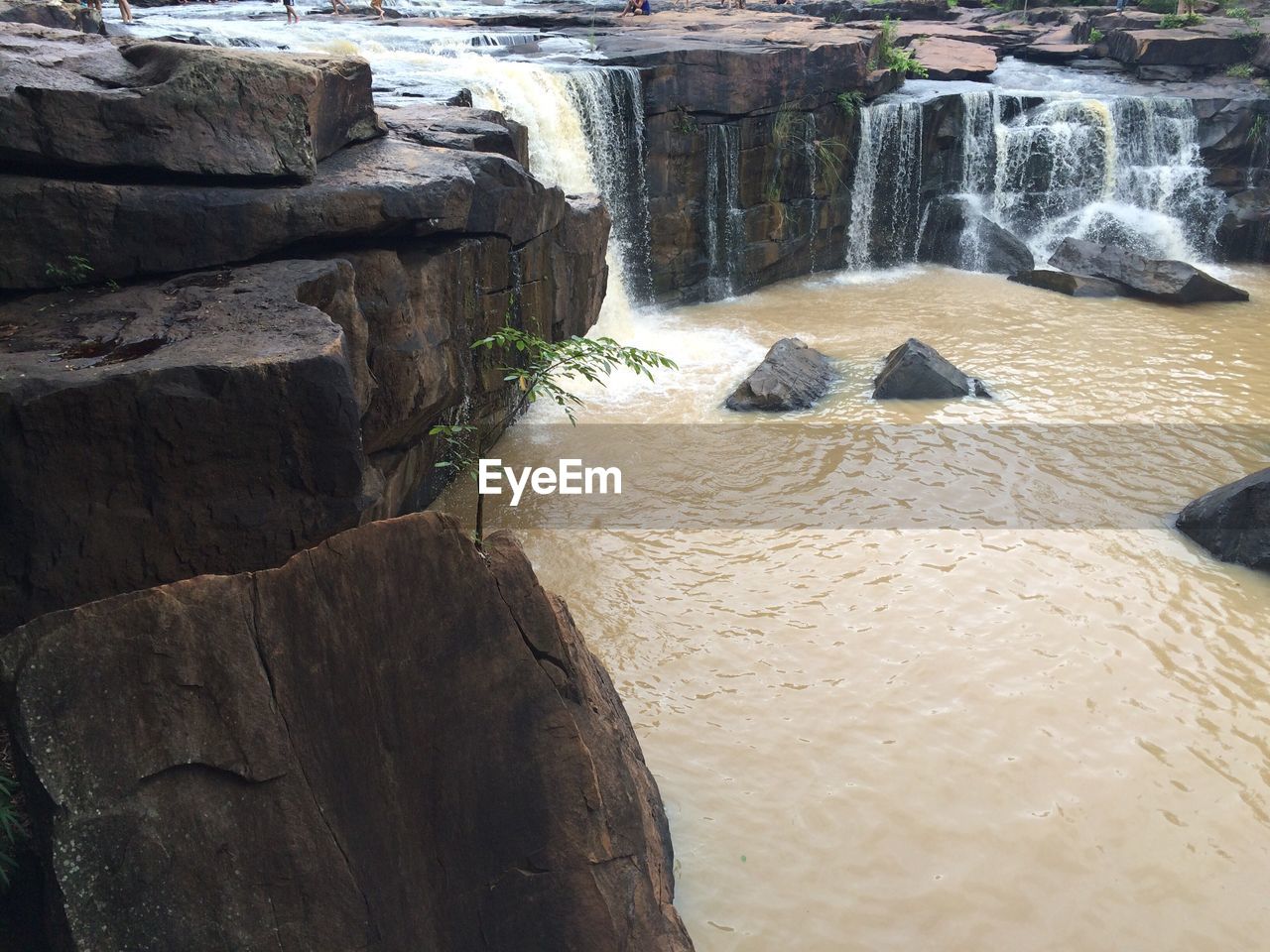 Scenic view of water flowing through rocks