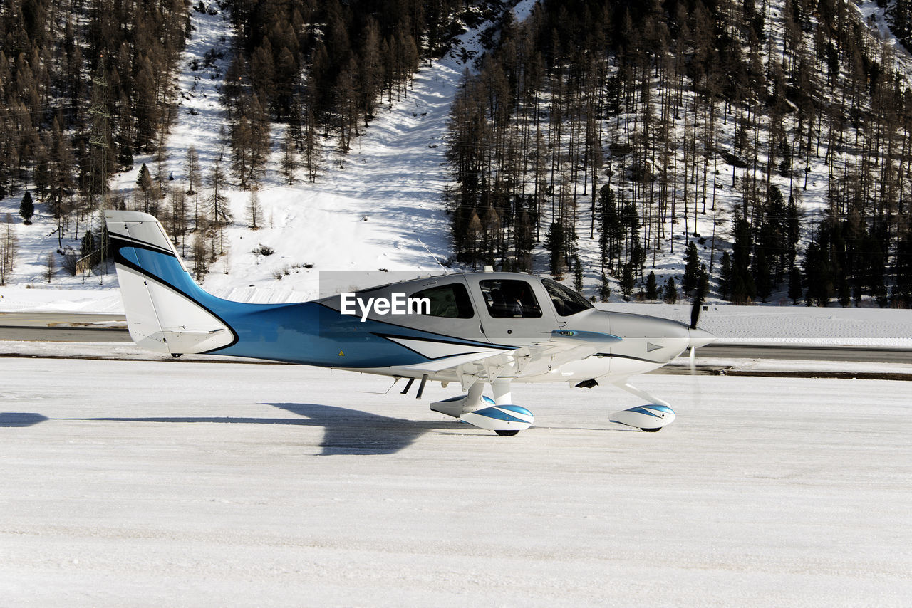 A private propeller jet landing at the engadine st moritz airport