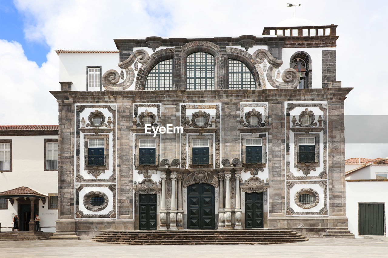 Historic building against cloudy sky