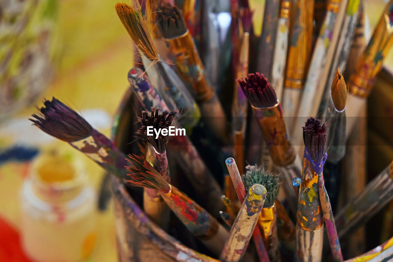 High angle view of paintbrushes in container