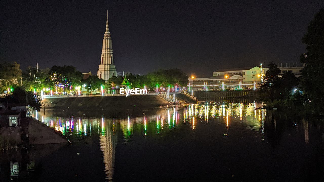 Illuminated buildings in city at night