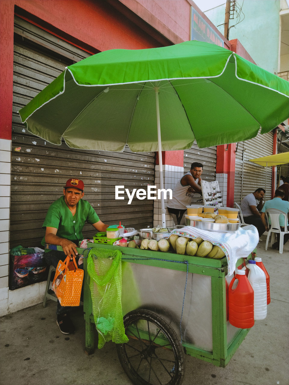 MAN WORKING AT MARKET