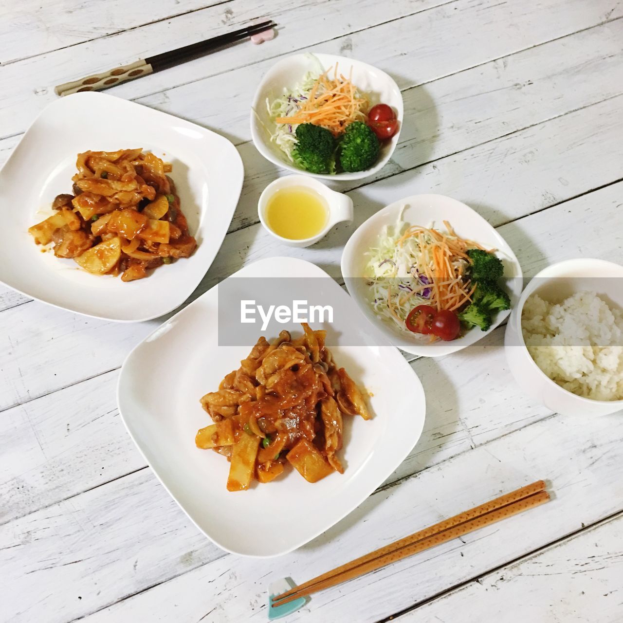 High angle view of food served on wooden table