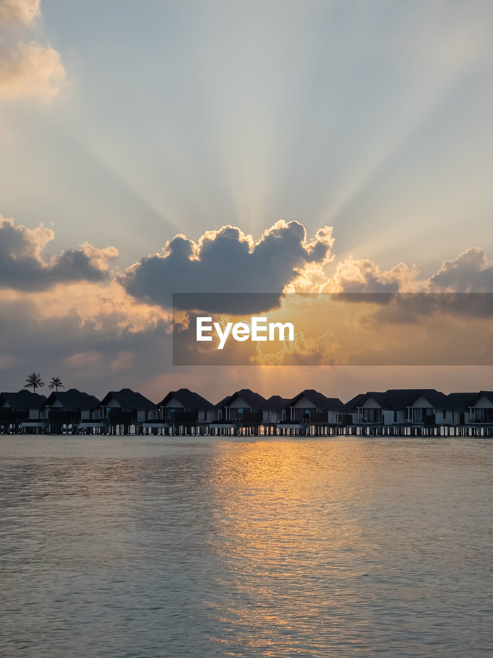 sky, water, cloud, sea, horizon, sunset, nature, architecture, beauty in nature, scenics - nature, travel destinations, city, reflection, tranquility, dusk, environment, built structure, sunlight, travel, mountain, no people, land, evening, landscape, tranquil scene, dramatic sky, outdoors, shore, ocean, beach, building exterior, idyllic, body of water, tourism, coast, bay, building, seascape, holiday, urban skyline, trip, sun, vacation, transportation