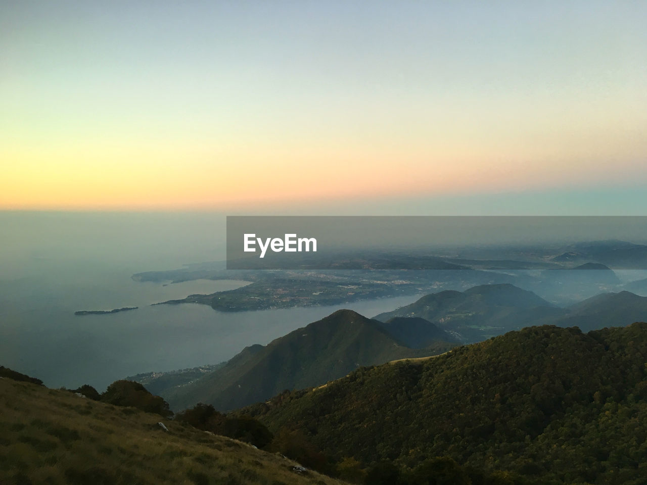 Scenic view of mountains against sky during sunset