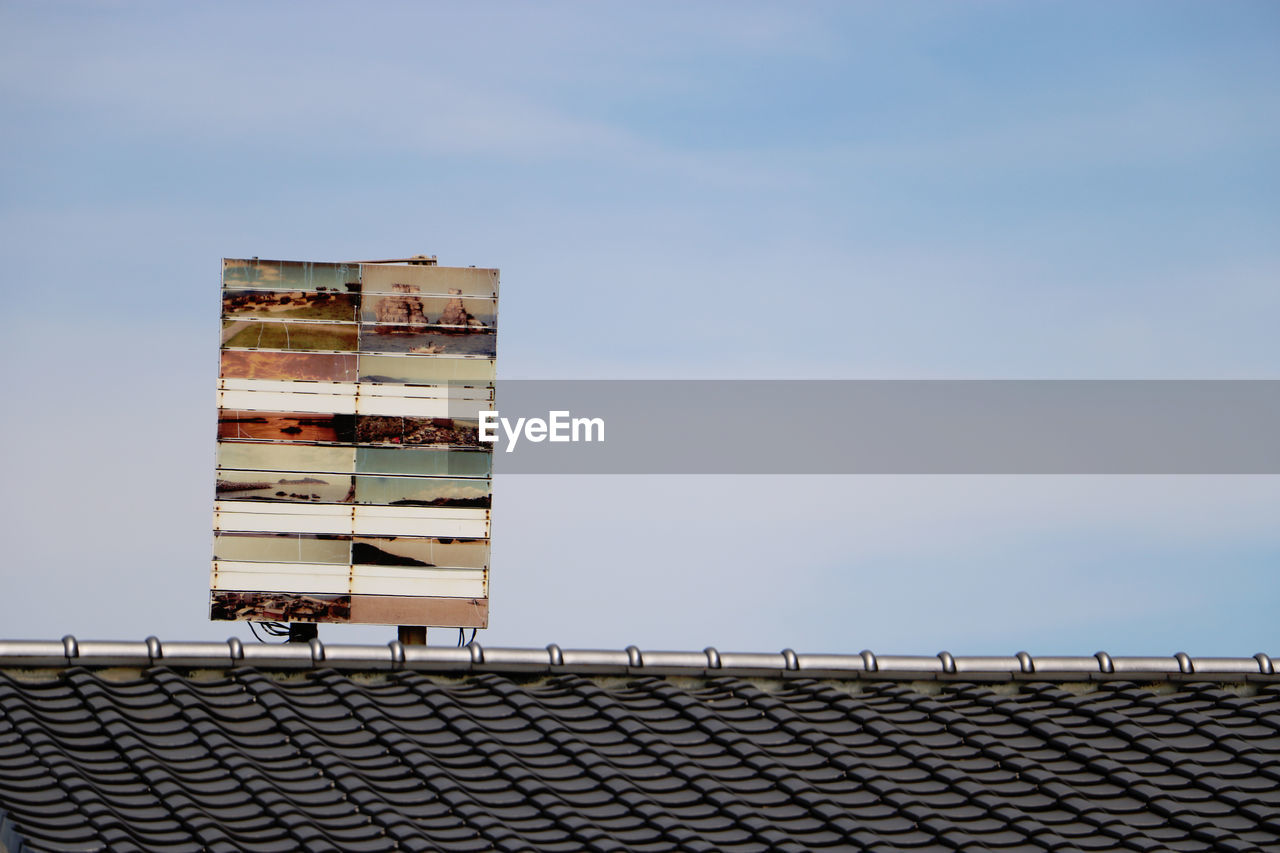 LOW ANGLE VIEW OF BUILDINGS AGAINST CLEAR SKY