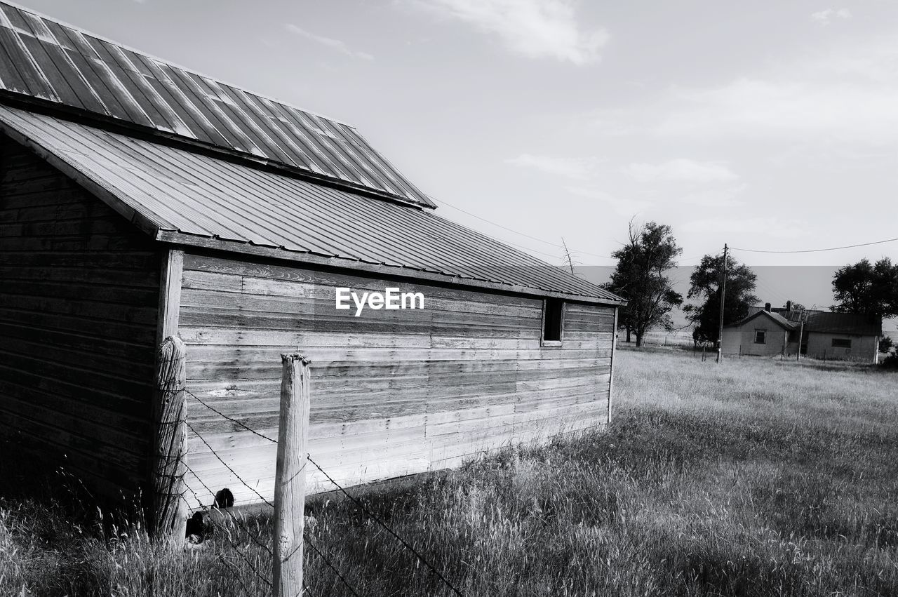 House on field against sky