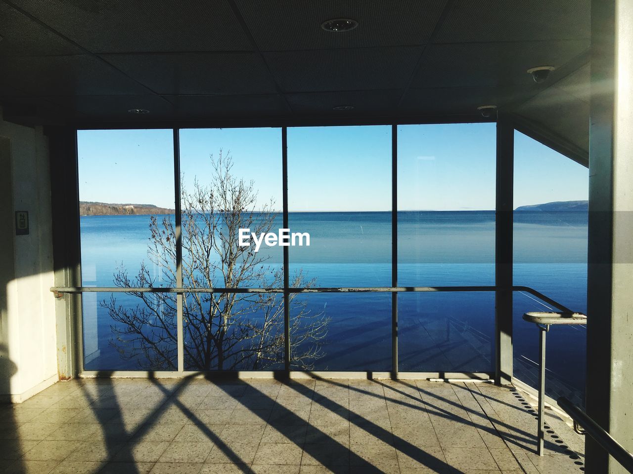 VIEW OF SEA THROUGH WINDOW