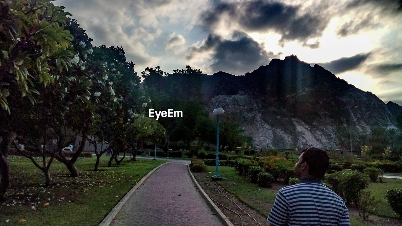 ROAD PASSING THROUGH MOUNTAINS