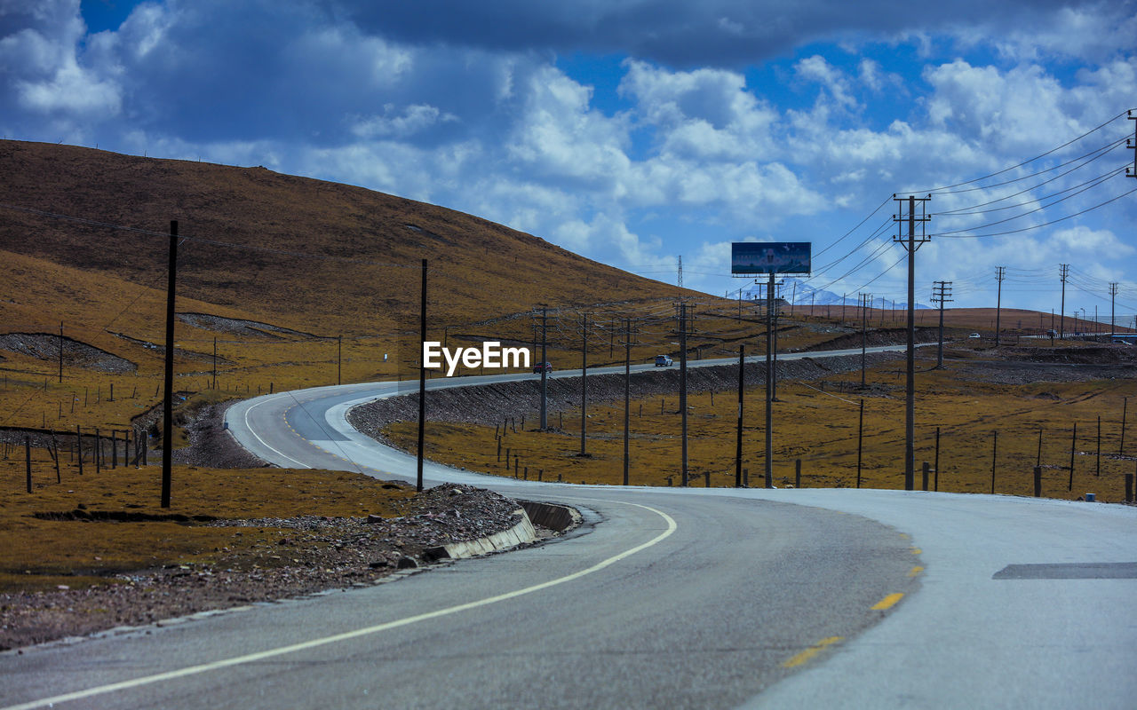 SCENIC VIEW OF ROAD AGAINST SKY