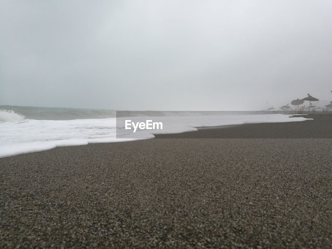 VIEW OF BEACH AGAINST SKY