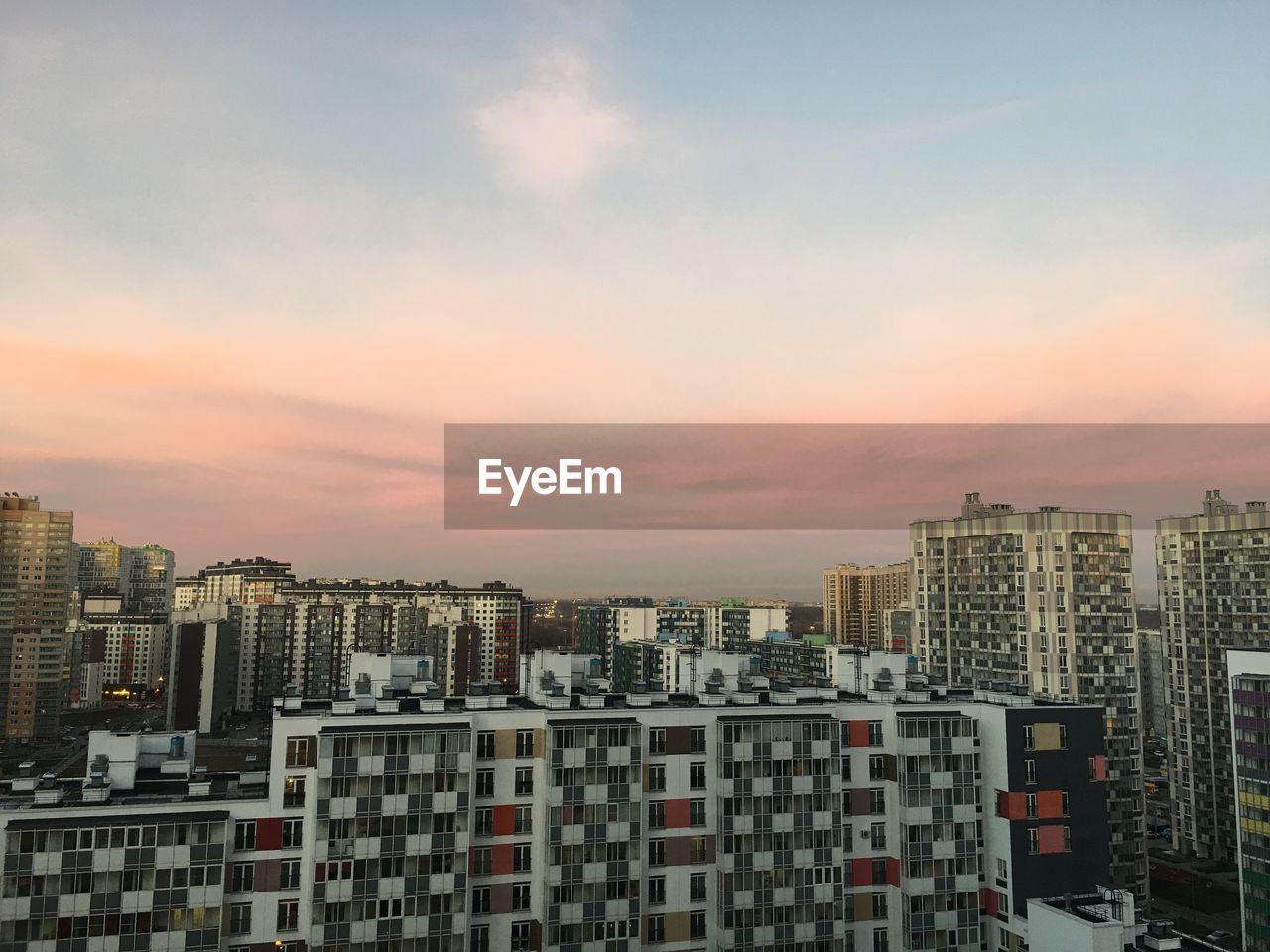 CITYSCAPE AGAINST SKY DURING SUNSET