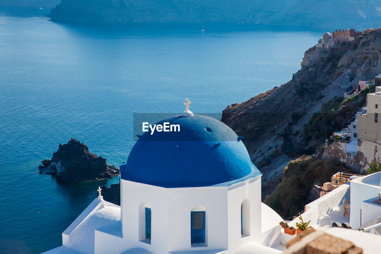 Traditional architecture of the churches of the oia city in santorini island