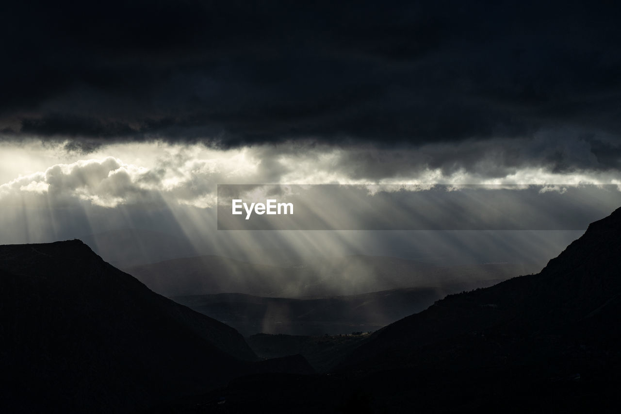 LOW ANGLE VIEW OF MOUNTAIN AGAINST SKY