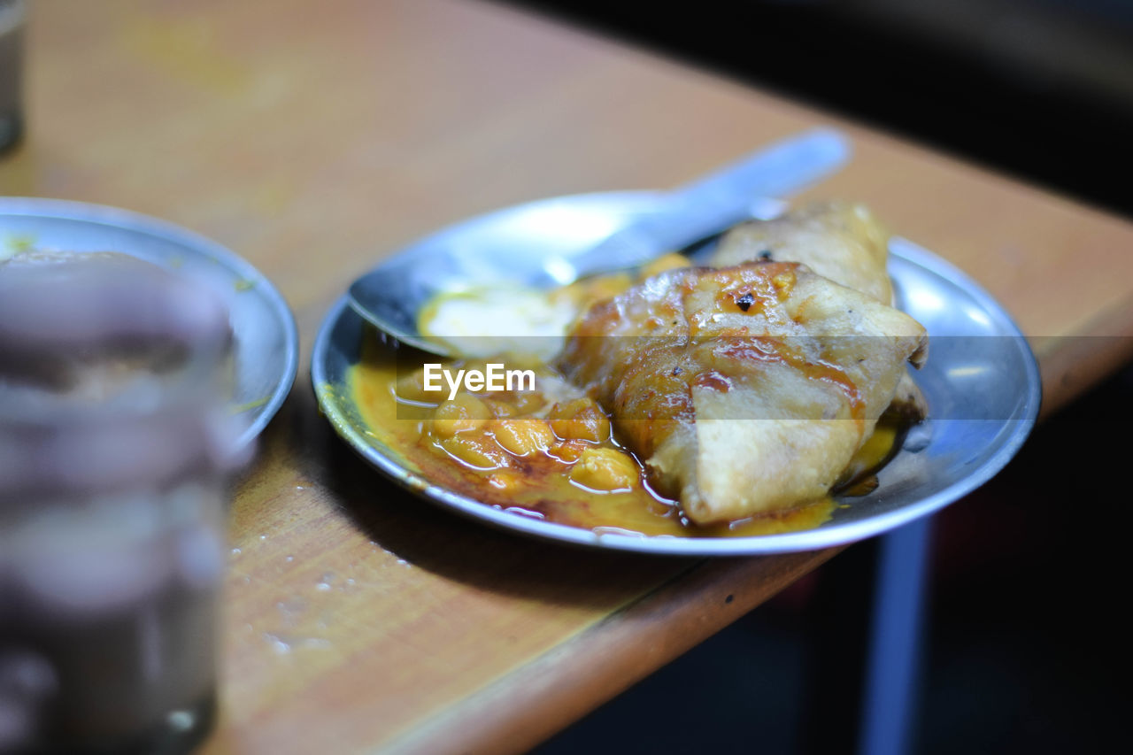 Close-up of meat in plate on table