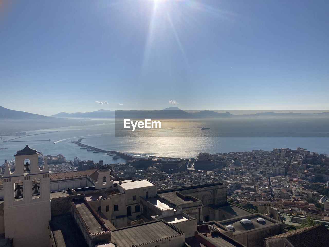 HIGH ANGLE VIEW OF BUILDINGS AGAINST SKY