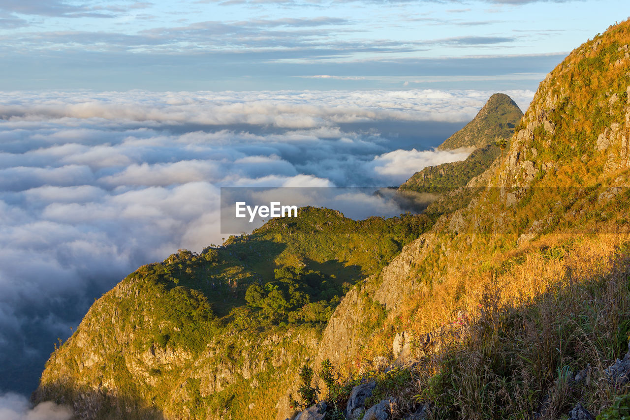 SCENIC VIEW OF MOUNTAIN BY LANDSCAPE AGAINST SKY