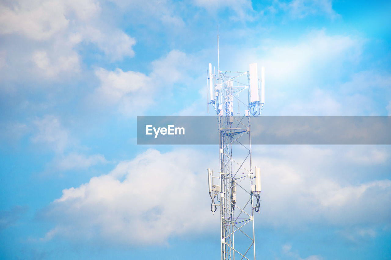 Low angle view of electricity pylon against sky