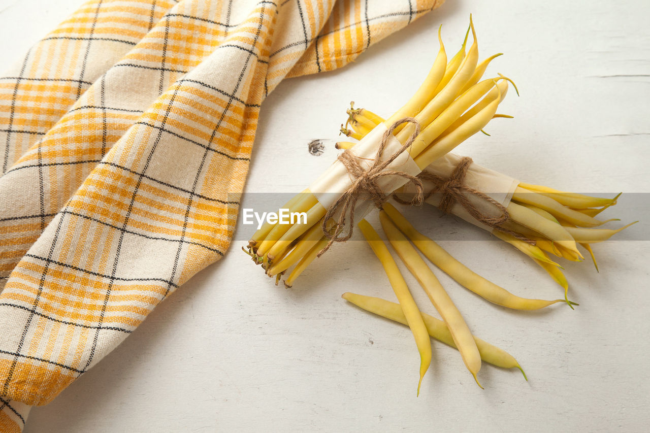 food and drink, food, yellow, healthy eating, wellbeing, freshness, indoors, no people, vegetable, high angle view, still life, studio shot, raw food, bunch, italian food, pasta, ingredient, produce, organic, group of objects