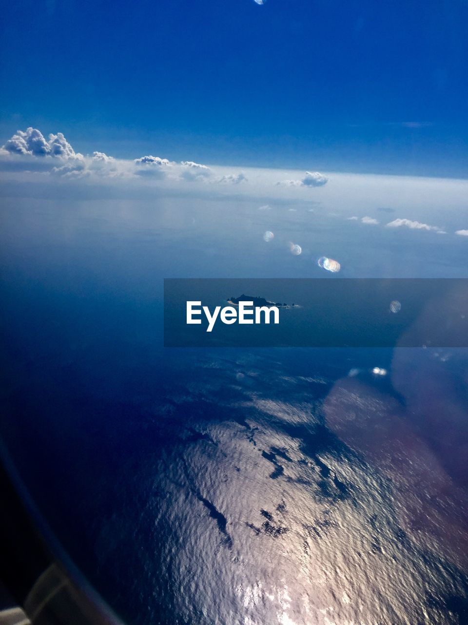 AERIAL VIEW OF SEA AND AIRPLANE