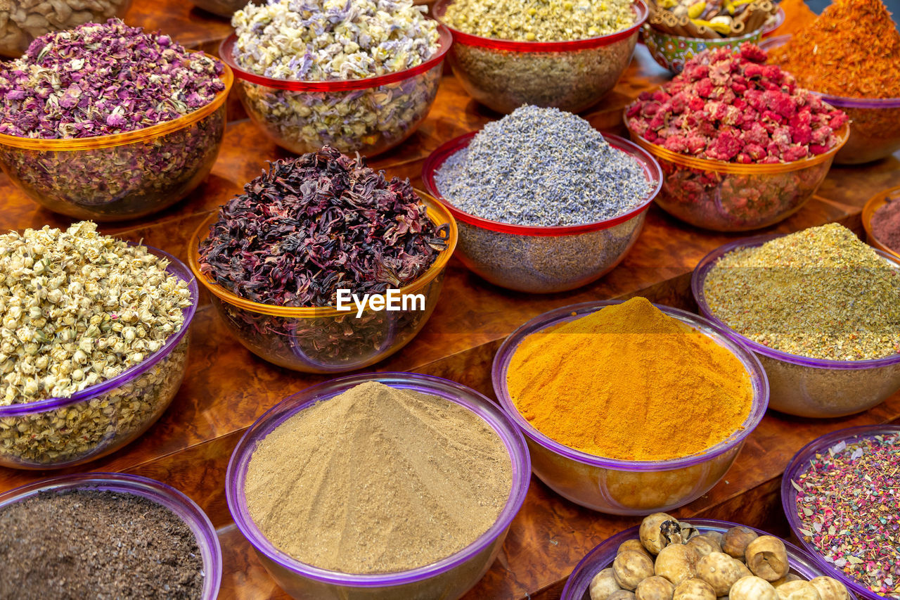 Variety of arabic spices and herbs in the traditional spice market in dubai. food ingredients.