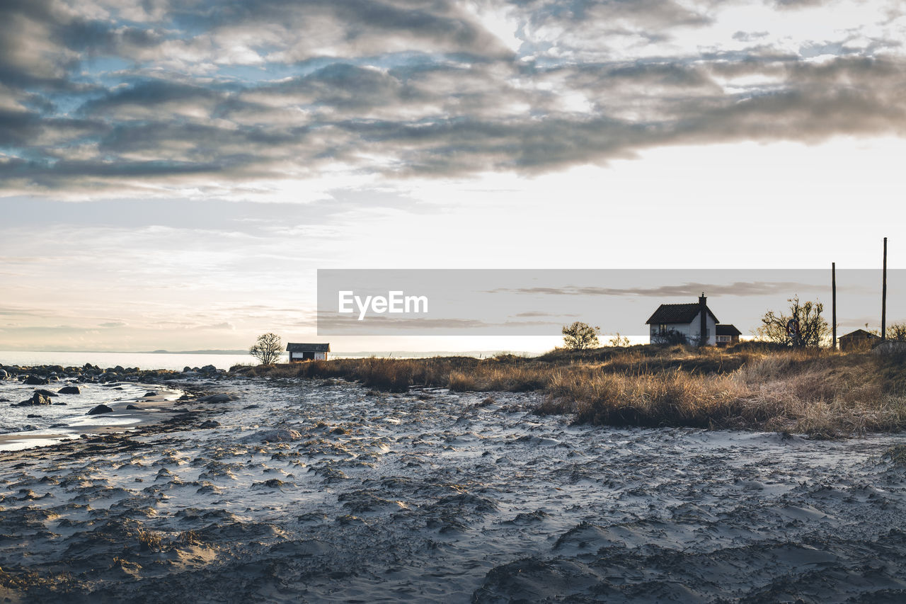 Scenic view of landscape against sky during winter