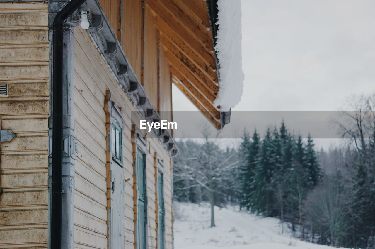 Low angle view of house during winter