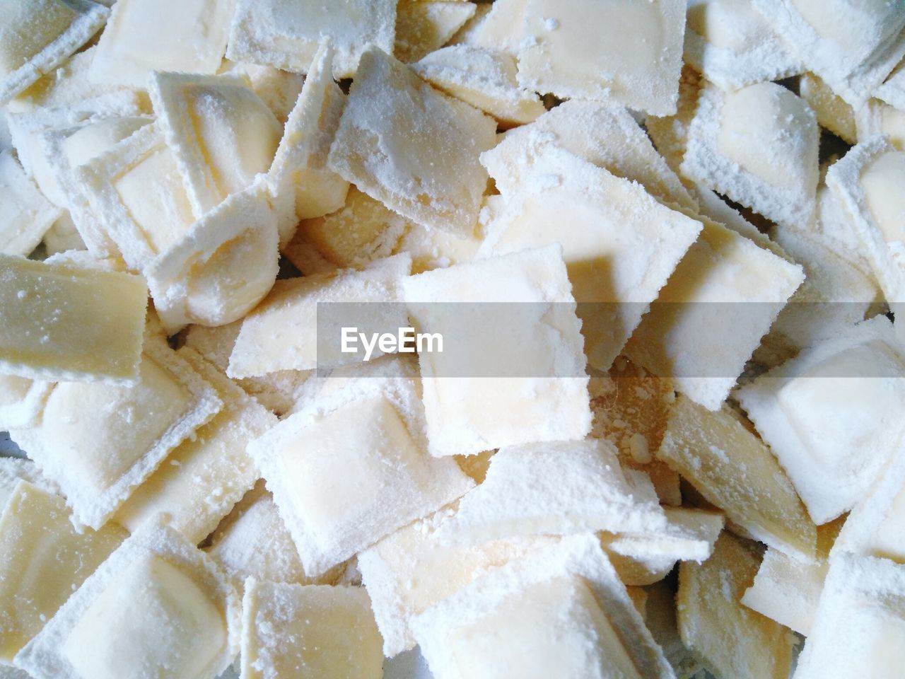 Full frame shot of raviolis covered with flour