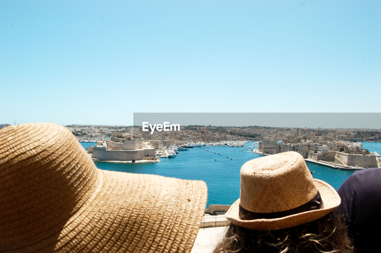 Rear view of people and old panorama