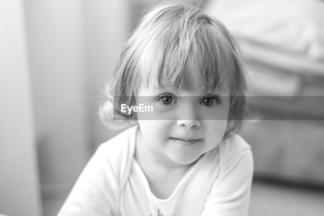 Portrait of cute girl at home