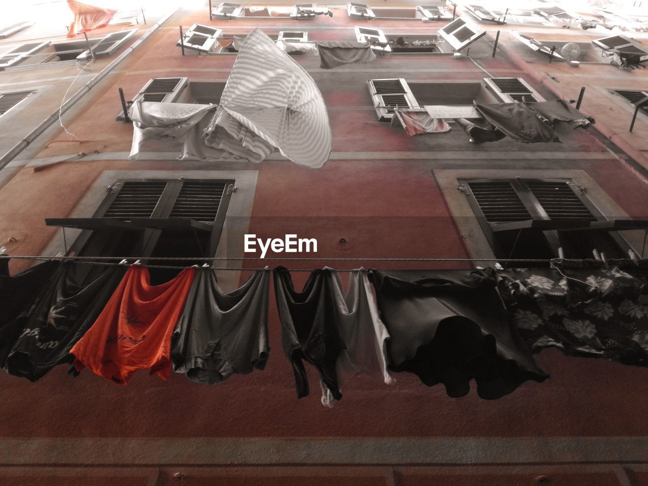 HIGH ANGLE VIEW OF CLOTHES DRYING HANGING