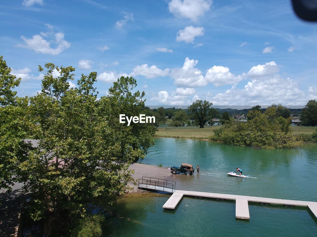 HIGH ANGLE VIEW OF RIVER AGAINST SKY