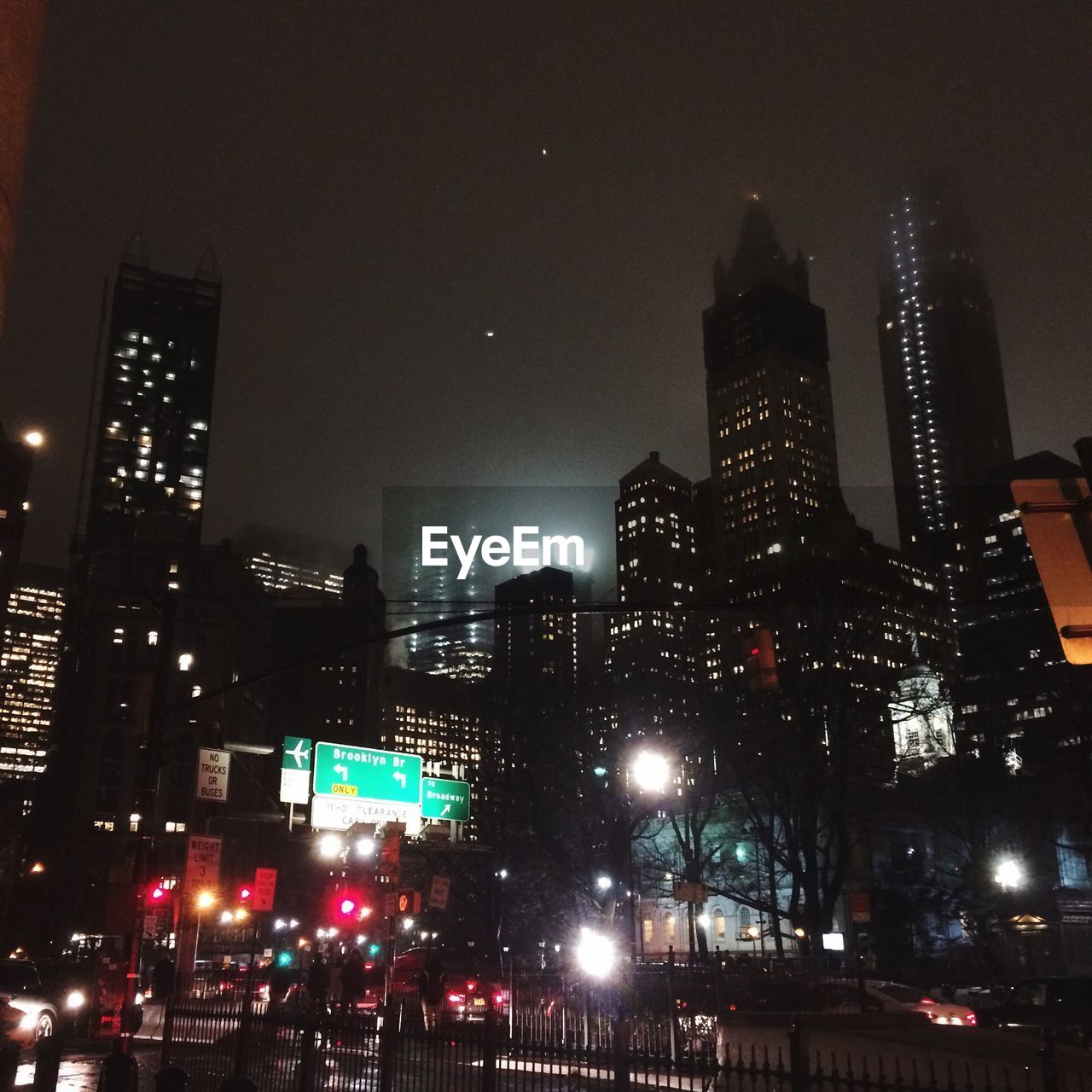 ILLUMINATED SKYSCRAPERS AT NIGHT