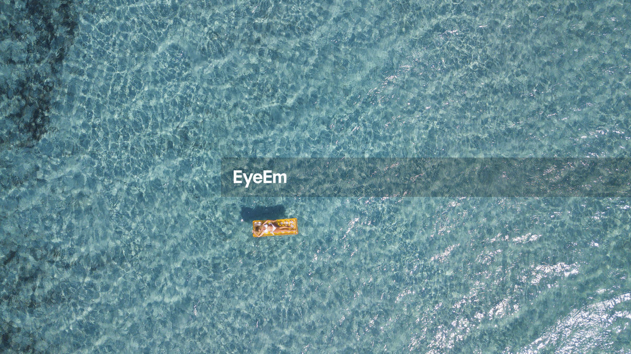 high angle view of boat sailing in sea