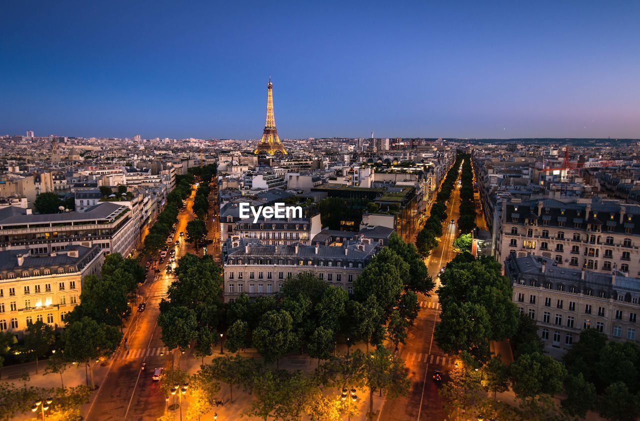 The eiffel tower towering over the city of paris
