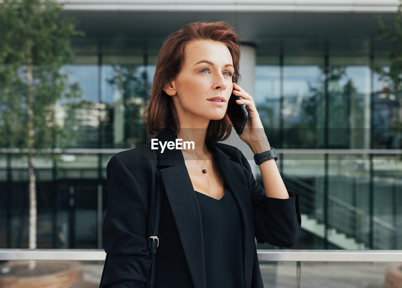 young businesswoman talking on mobile phone