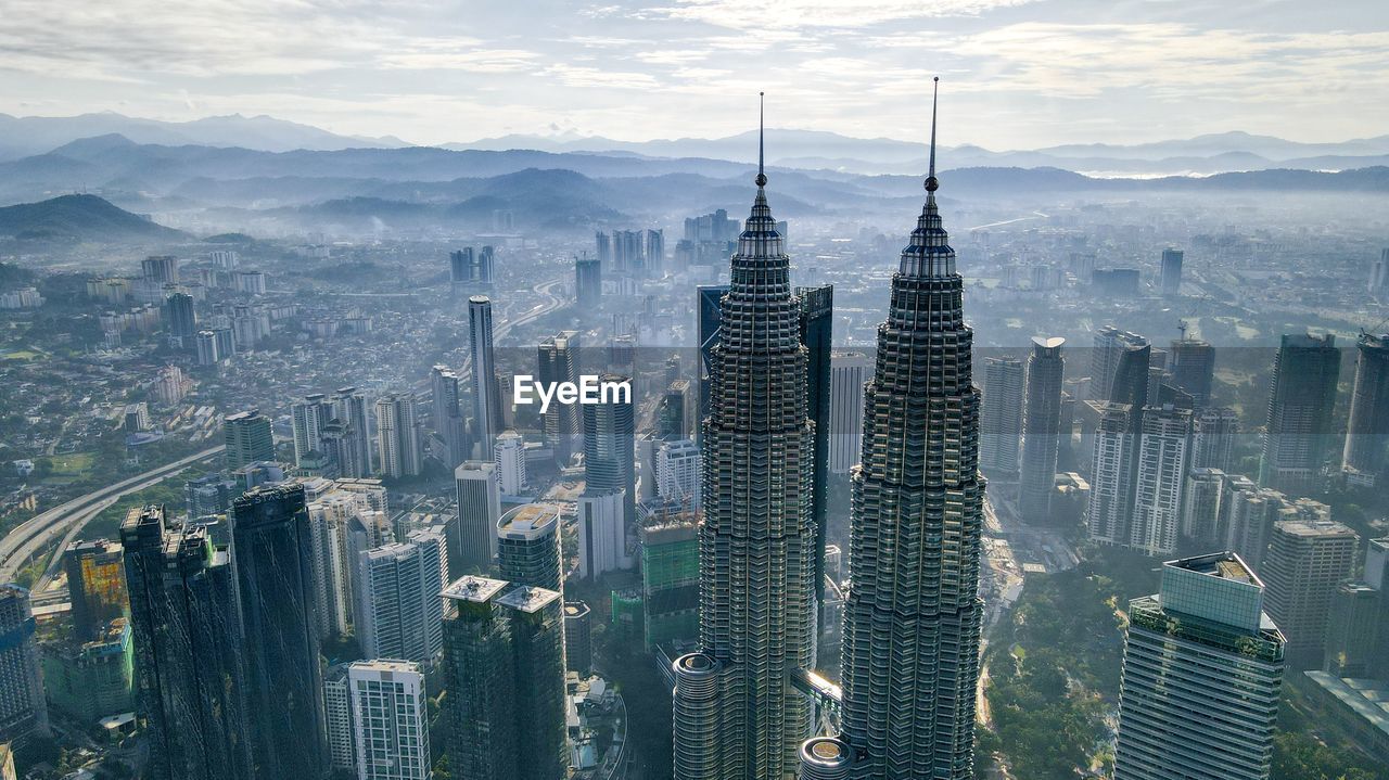 Aerial view sunrise of klcc tower kuala lumpur city centre