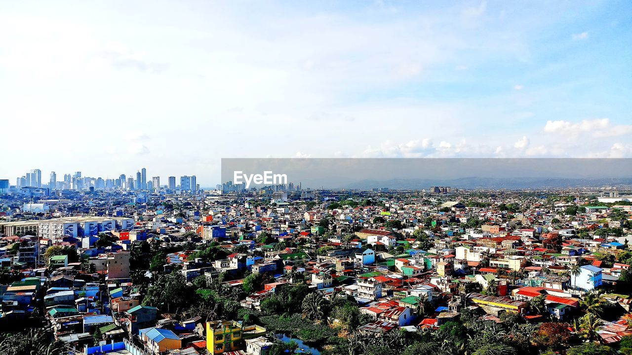 High angle shot of townscape against sky