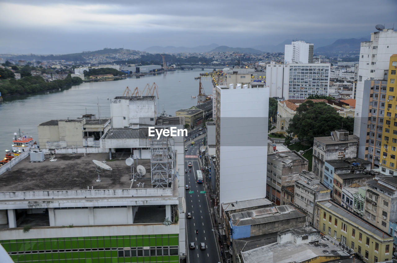 HIGH ANGLE VIEW OF BUILDINGS AGAINST SKY