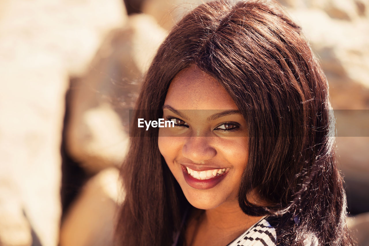 Portrait of smiling young woman