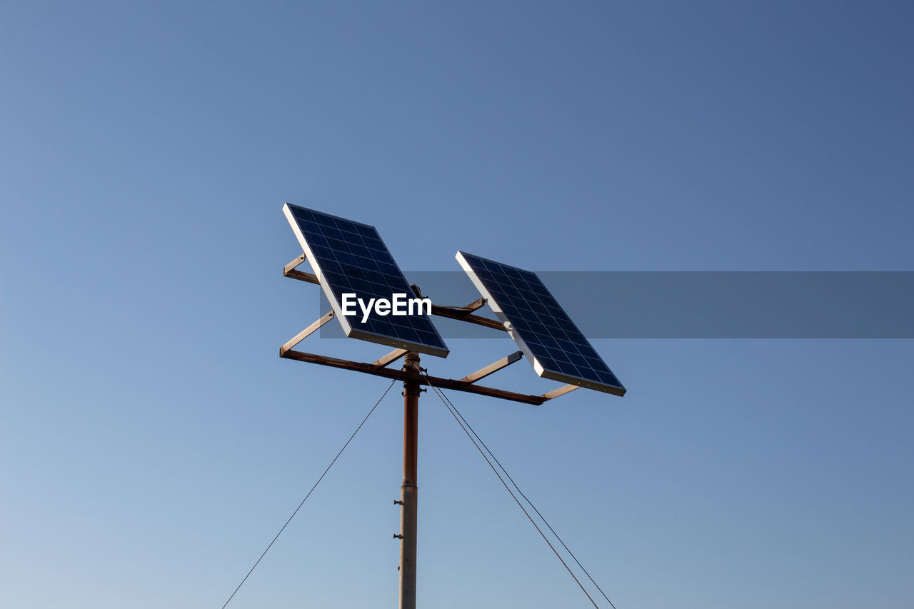 A solar panels with the background of a cloudless sky