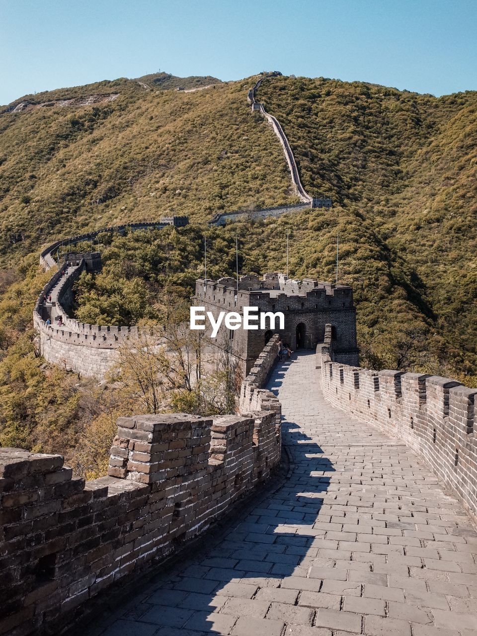 View of people on mountain against the sky