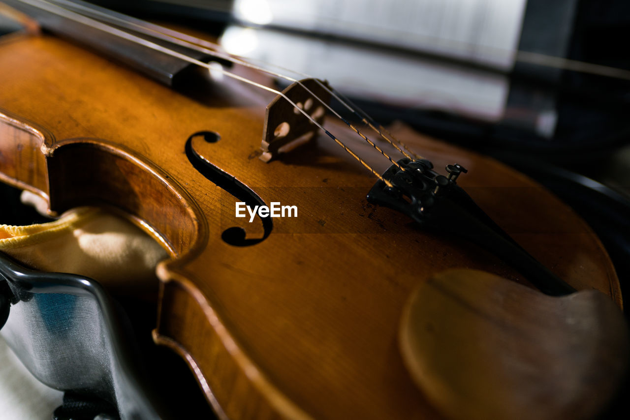 Close-up of violin on table