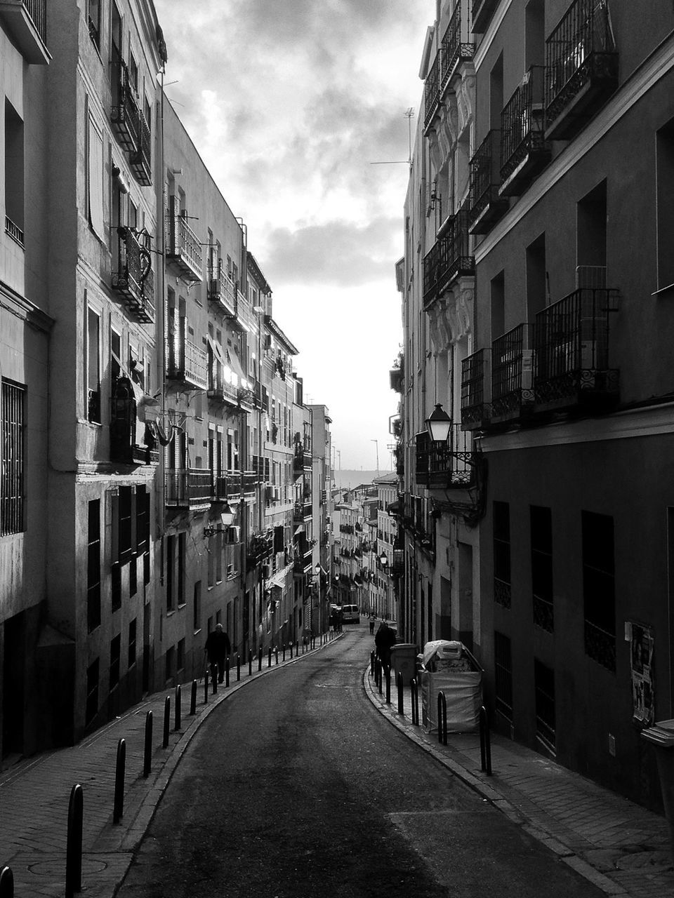 VIEW OF CITY STREET AGAINST SKY