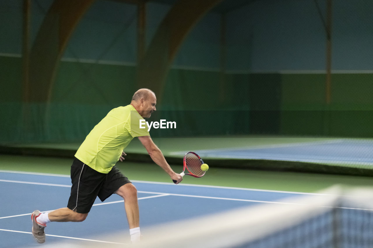 Man playing tennis