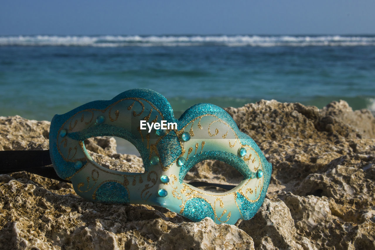 CLOSE-UP OF SEA WATER ON ROCK