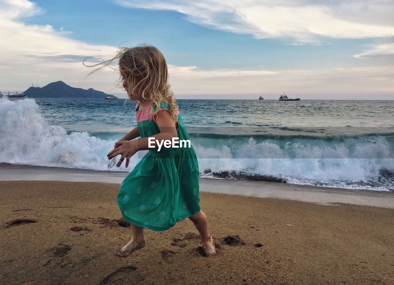 Girl running on beach