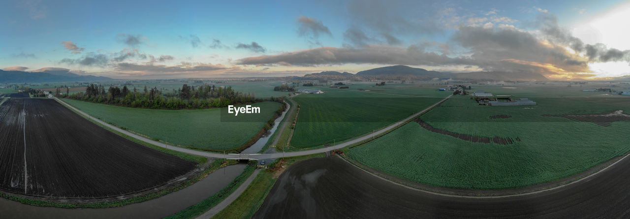 Aerial farmland panorama during golden hour