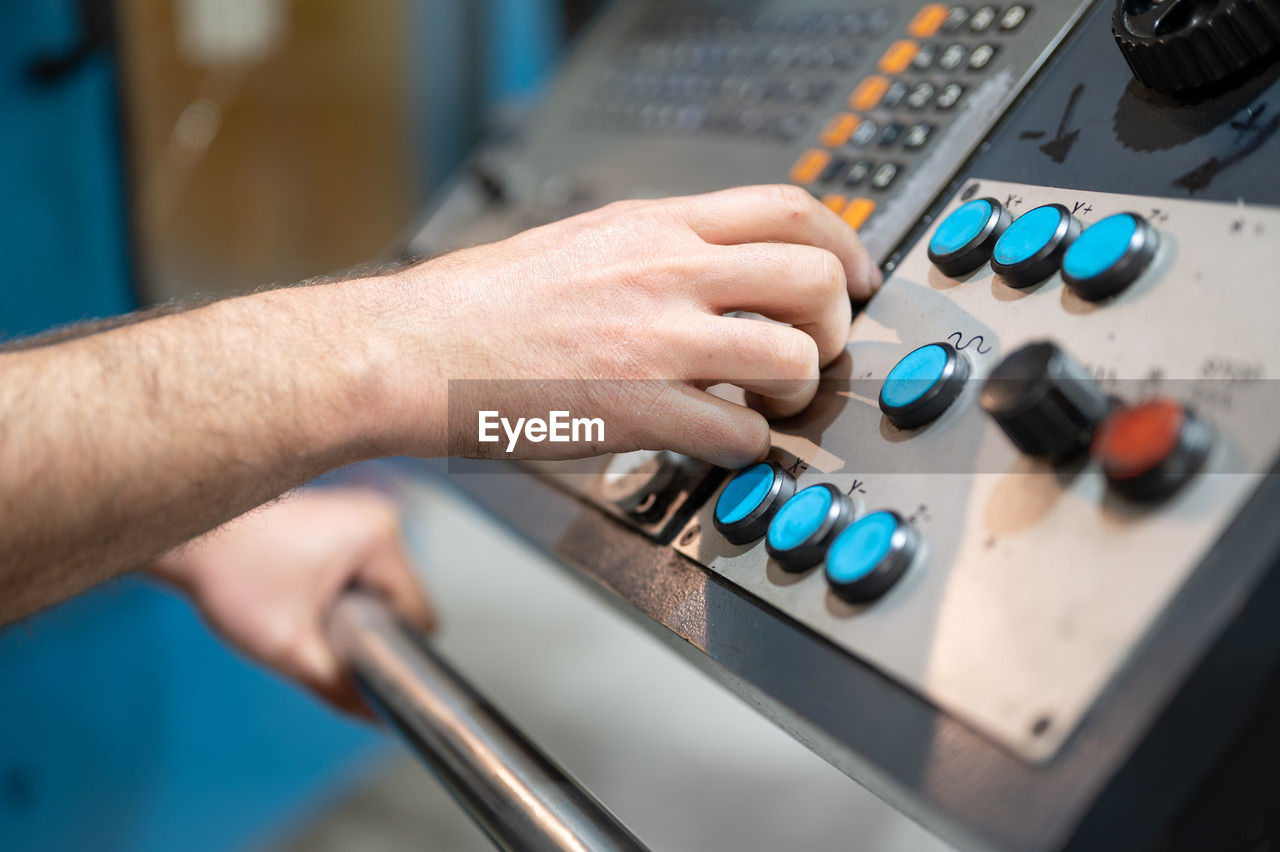 cropped image of man using sound mixer