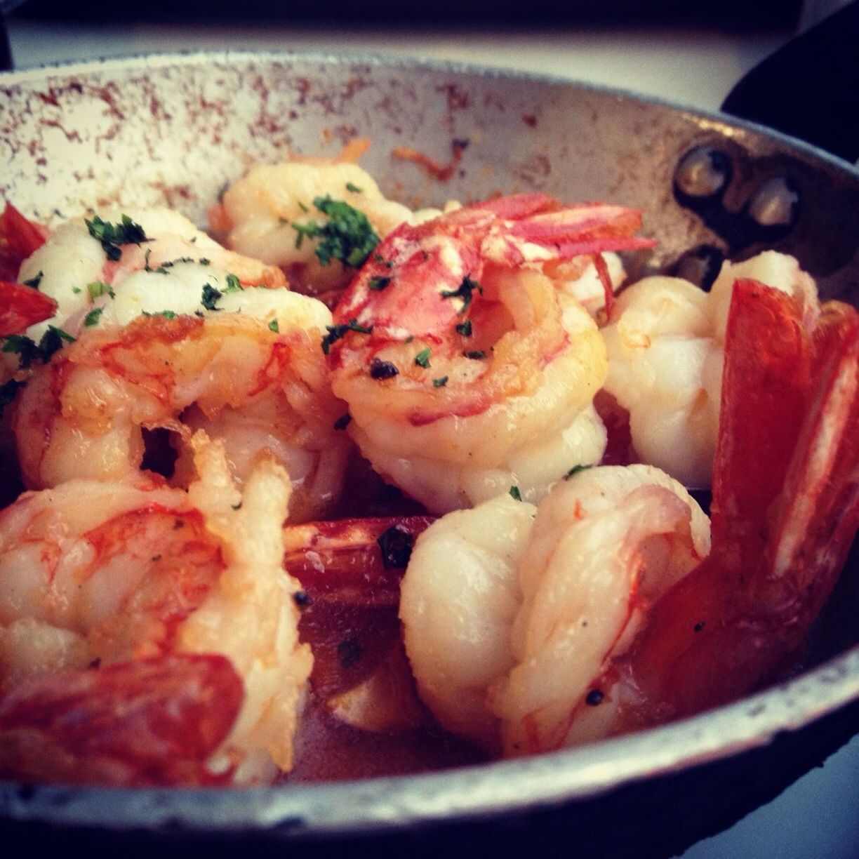 Close-up of prawns in frying pan